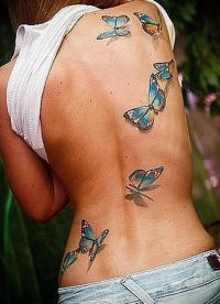 татуировки на спине женские 7